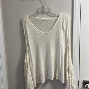 Garage poncho sweater